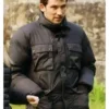 Rev. Jud Duplenticy Movie Wake Up Dead Man 2025 Josh O'Connor Black Puffer Jacket