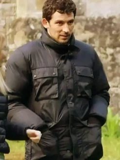 Rev. Jud Duplenticy Movie Wake Up Dead Man 2025 Josh O'Connor Black Puffer Jacket