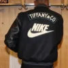 Buy-Mens-and-Womens-Black-Tiffany-and-Co-X-Nike-Varsity-Bomber-Jacket-with-Leather-Sleeves.webp