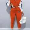 NFL-Dallas-Cowboys-Orange-Tracksuit.webp
