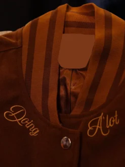 A'ja Wilson Playa Society x Nike WNBA Brown Varsity Jacket front view
