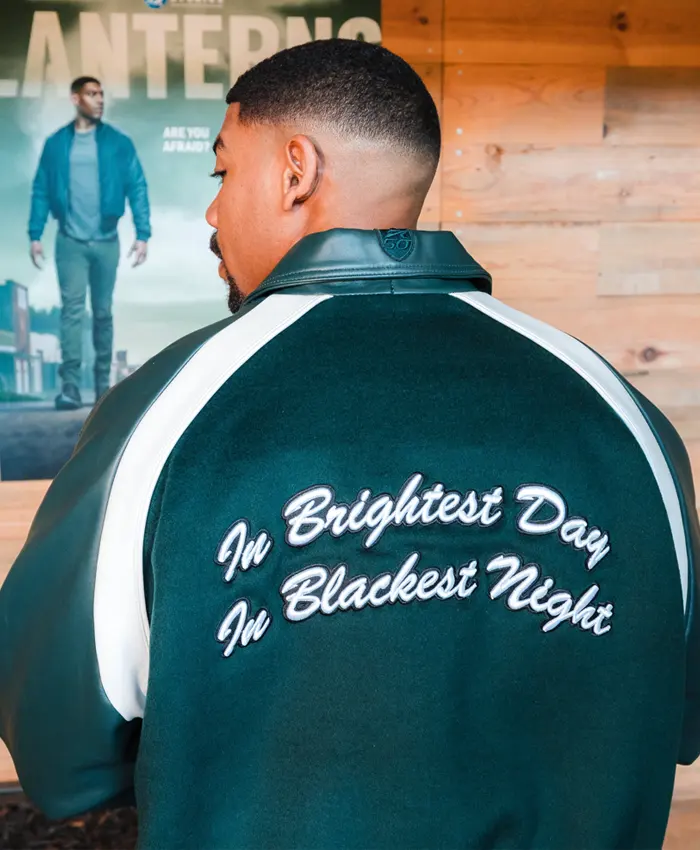 Back view of Aaron Pierre Custom Green Leather Varsity Jacket in vibrant green