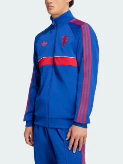Close-up of Manchester United Adidas 26-27 Blue Tracksuit with YKK zipper