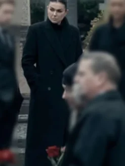 Karla Dixon Reacher Season 2 Black Coat featuring double-breasted button closure
