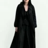 Mabel Mora Only Murders In The Building Selena Gomez Black Cotton Trench Coat front view
