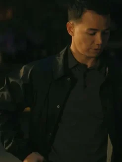 Side view of Swan Reacher S02 Black Jacket featuring a clean, modern silhouette