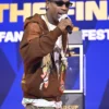 Travis Scott Fanatics Fest NYC 2026 Brown Jacket Side View