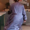 Back view of Mabel Mora Only Murders In The Building Silk Purple Polka Dot Coat