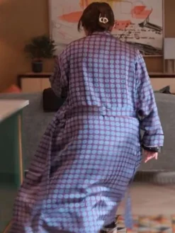 Back view of Mabel Mora Only Murders In The Building Silk Purple Polka Dot Coat