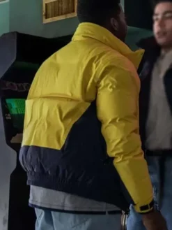 Back view of Power Book III Raising Kanan Mekai Curtis Black And Yellow Puffer Jacket