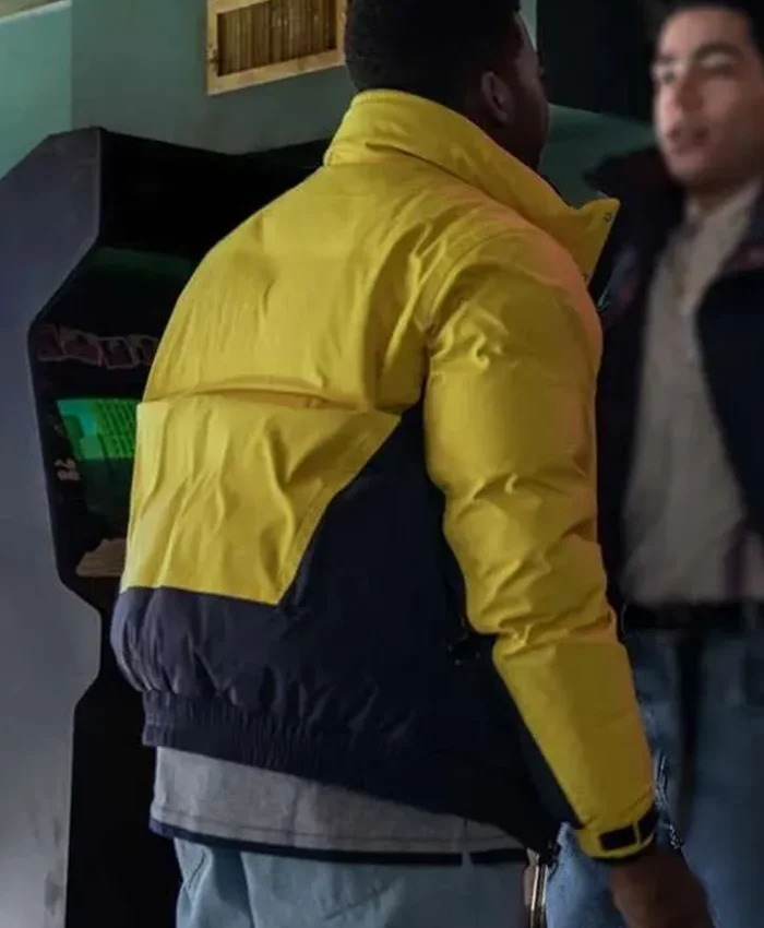 Back view of Power Book III Raising Kanan Mekai Curtis Black And Yellow Puffer Jacket