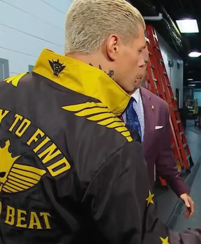 Close-Up of Cody Rhodes Easy To Find Hard To Beat Windbreaker Black And Gold Jacket