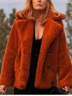 Close-up of Beth Dutton Yellowstone Orange Fluffy Shearling Fur Coat Jacket