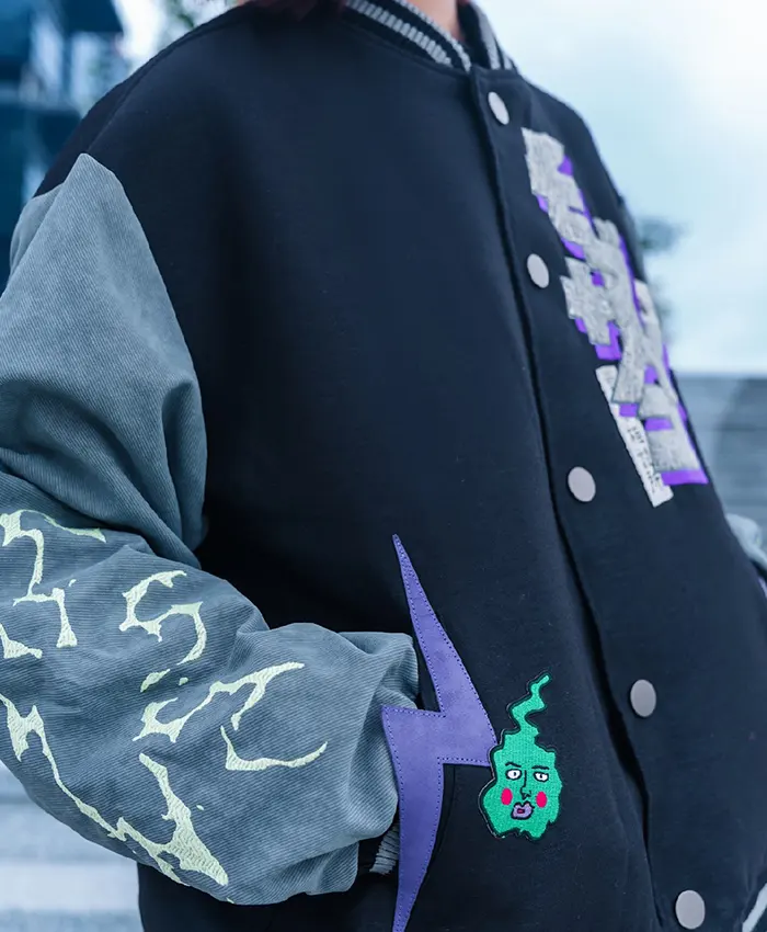 Close-up of Bibisama Mob Psycho 100 Shigeo Navy And Grey Wool Fleece Varsity Jacket