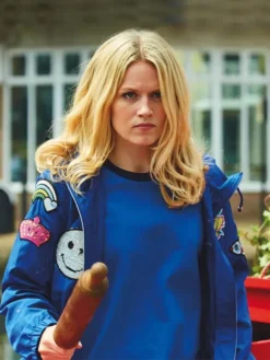 Close-up of Cara Theobold Jo Blue Cotton Patches Zomboat Jacket