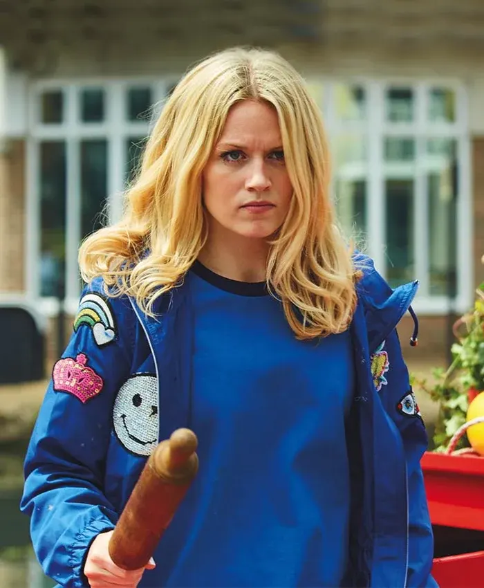 Close-up of Cara Theobold Jo Blue Cotton Patches Zomboat Jacket