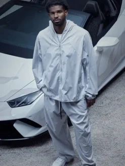 Close-up of Cleveland Browns Shedeur Sanders Nike Air DT Max 96 White Polyester Tracksuit