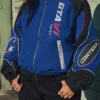 Close-up of Corteiz x Grand Theft Auto VI Blue And Black Racing Zip-Up Hooded Jacket