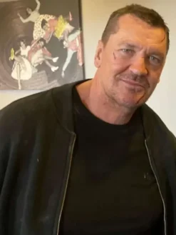 Close-up of Craig Fairbrass Rise of the Footsoldier Retribution 2026 Black Satin Bomber Jacket