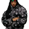 Close-up of Denim Tears x André Leon Talley Fall 2026 Black Bandana Parachute Puffer Jacket
