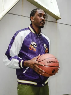 Close-up of Jalen Williams A Bathing Ape Purple And White Satin Souvenir Skull Bomber Jacket