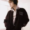 Close-up of Kim Taehyung Champion FW26 Brown Wool Varsity Jacket
