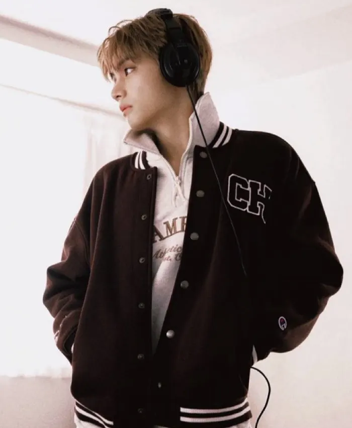 Close-up of Kim Taehyung Champion FW26 Brown Wool Varsity Jacket