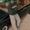 Close-up of Kith for BMW 2026 Vitality Green Zip-Up Suede Coaches Jacket