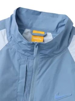 Close-up of Nike x NOCTA Woven Light Blue Polyester Track Jacket