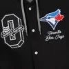 Close-up of OVO x MLB Toronto Blue Jays Black Insulated Cotton Twill Bomber Jacket