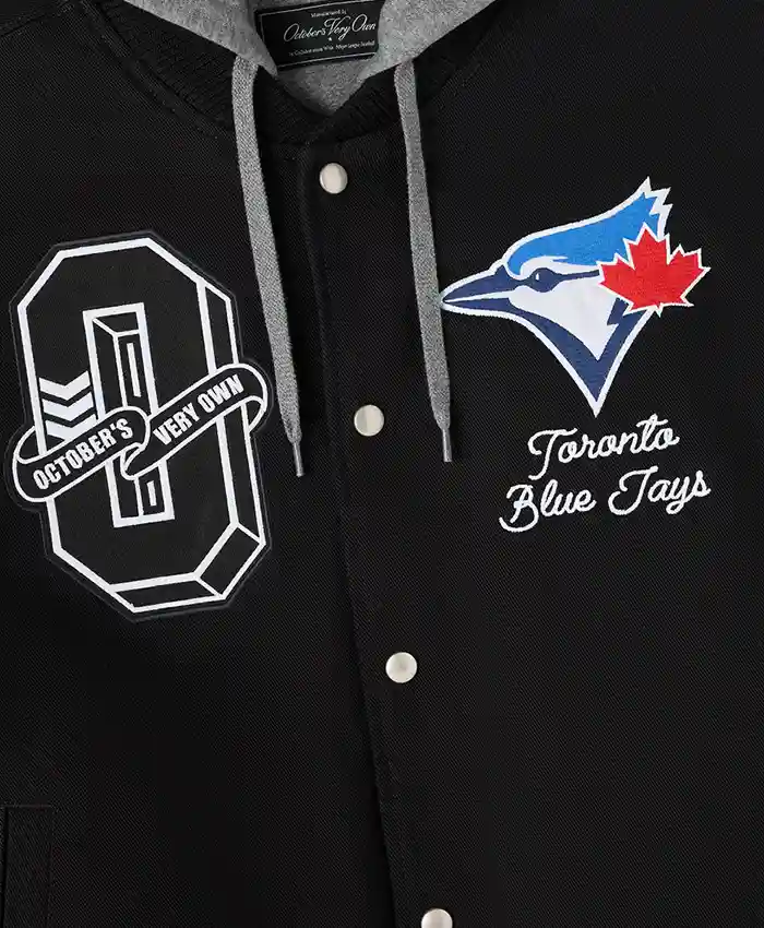 Close-up of OVO x MLB Toronto Blue Jays Black Insulated Cotton Twill Bomber Jacket