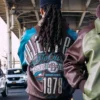 Close-up of Pelle Pelle Fall 2026 True To Our Roots Brown And Teal Leather Bomber Jacket