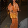 Close-up of Rihanna New York City Chloé Caramel Velvet Tracksuit