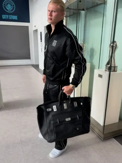 Close-up of Shop Norway Soccer Player Erling Haaland Black Loewe Fleece Tracksuit
