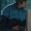 Close-up of Spike Fearn Movie Finding Emily 2026 Owen Brompton Blue Track Bomber Jacket