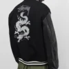Close-up of Stüssy x eYe Junya Watanabe Man Black Wool Leather Dragon Print Varsity Jacket