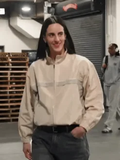 Close-up of WNBA Indiana Fever vs. Chicago Sky Caitlin Clark Beige Track Jacket