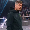 Close-up of WWE NXT Grayson Waller Stay Real Black Fleece Hooded Jacket
