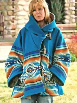 Close-up of Yellowstone S03 E06 Beth Dutton Blanket Turquoise Hooded Poncho Coat