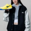 Close view WNBA Caitlin Clark x Slam Kicks Nike Black And White Varsity Jacket