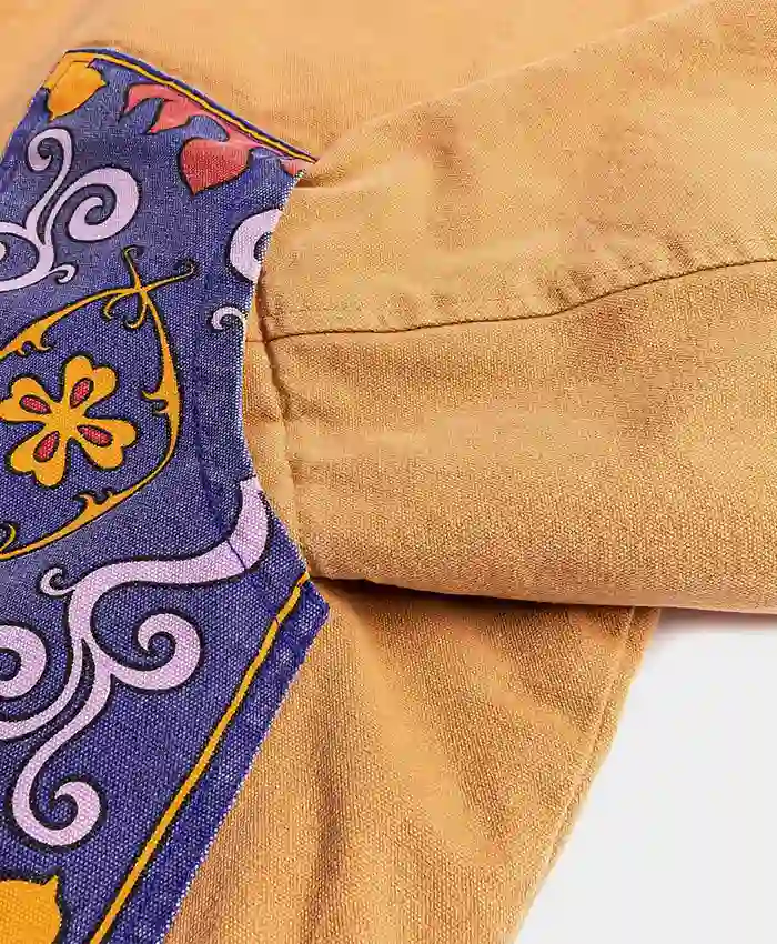 Close view of Disney Aladdin Genie x Shoe Palace Brown And Blue Corduroy Collar Workwear Jacket