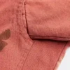 Close view of Disney The Lion King x Shoe Palace Brown And Orange Cotton Lifestyle Jacket