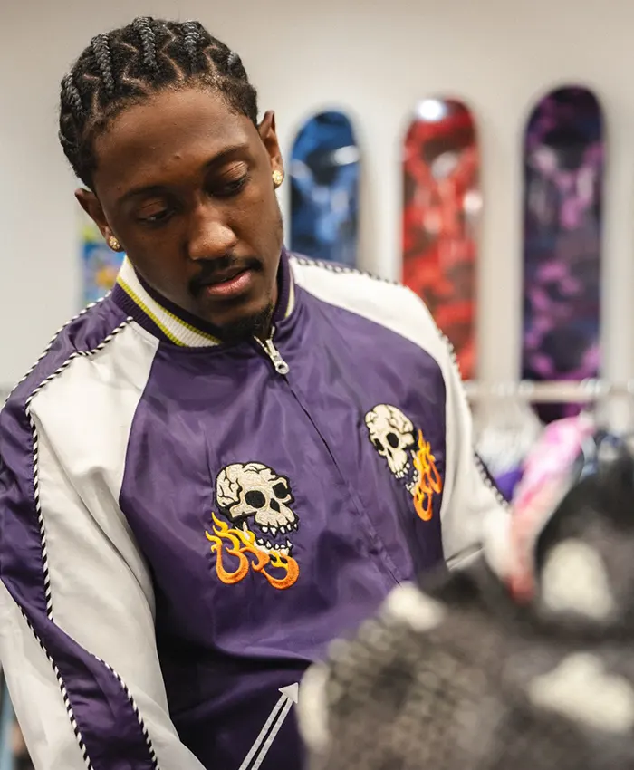 Close view of Jalen Williams A Bathing Ape Purple And White Souvenir Skull Satin Bomber Jacket
