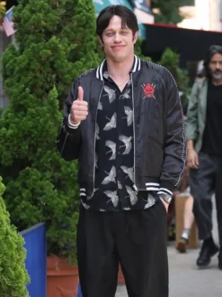 Close view of Pete Davidson Tommy Karate Tommy Pitera Black Satin Okinawa Halloween Bomber Jacket