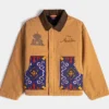 Disney Aladdin Genie x Shoe Palace Video Vault Brown And Blue Corduroy Collar Workwear Jacket front view