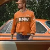 Kith for BMW 2026 Captain Orange Satin Varsity Bomber Jacket front view