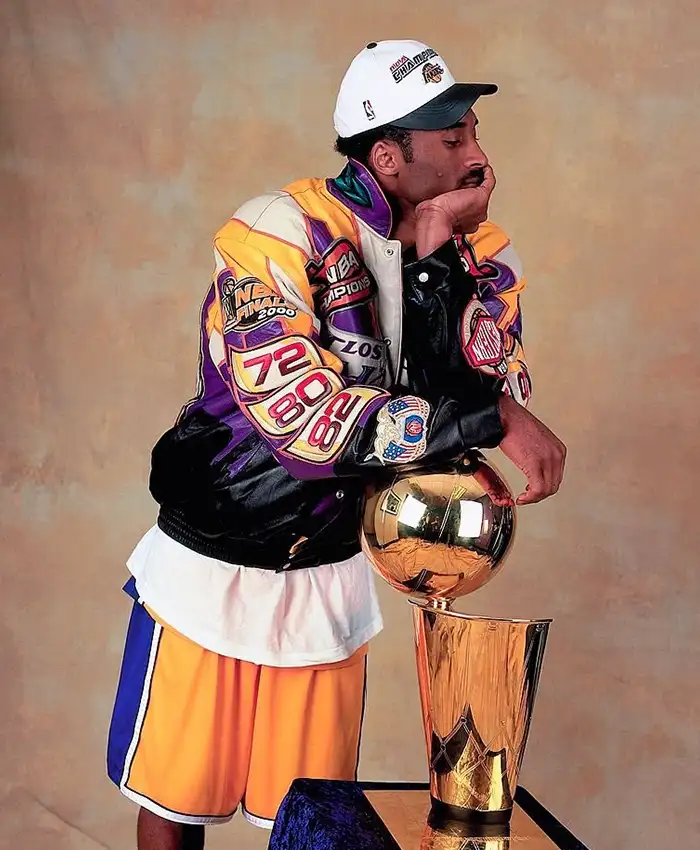 LA Lakers 2000 Championship Leather Jacket featuring stand-up collar, snap-tab closure, and buttoned cuffs