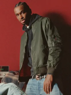 Levi's Olive Green MA-1 Bomber Jacket featuring rib-knitted collar, cuffs, and YKK zipper closure