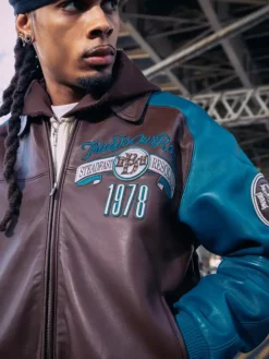 Pelle Pelle Fall 2026 True To Our Roots Brown And Teal Bomber Leather Jacket front view