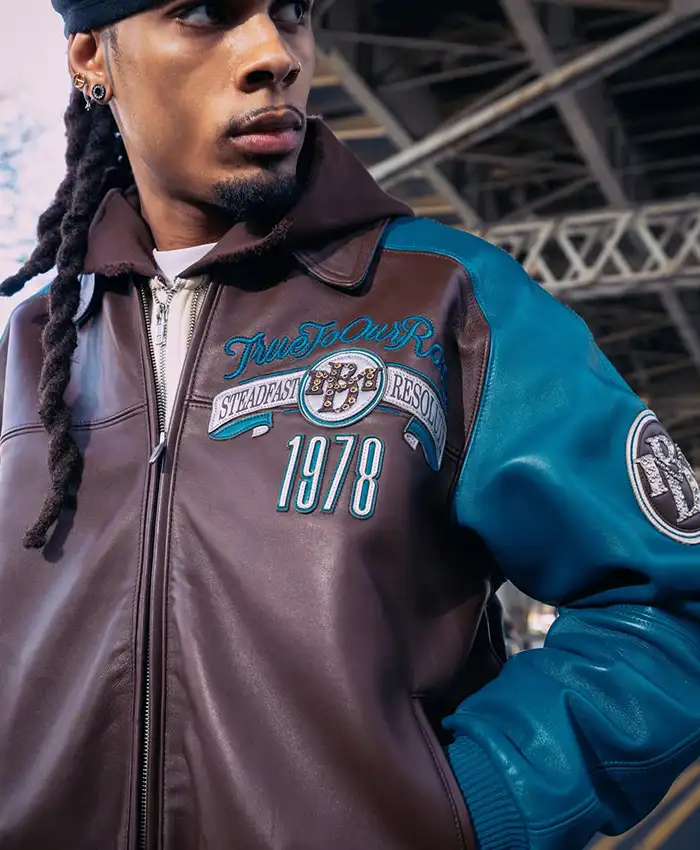 Pelle Pelle Fall 2026 True To Our Roots Brown And Teal Bomber Leather Jacket front view
